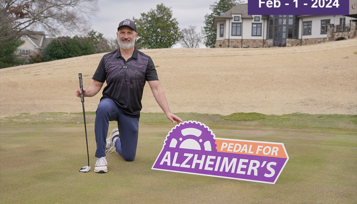 Knoxville health expert Eddie Reymond announces the Eddie’s 550 Tee Off for Alzheimer’s charity golf event that will welcome celebrities and the public to join in the fight against Alzheimer’s. Eddie practicing on the gold course with a Pedal for Alzheimer's sign for his charity golf event.