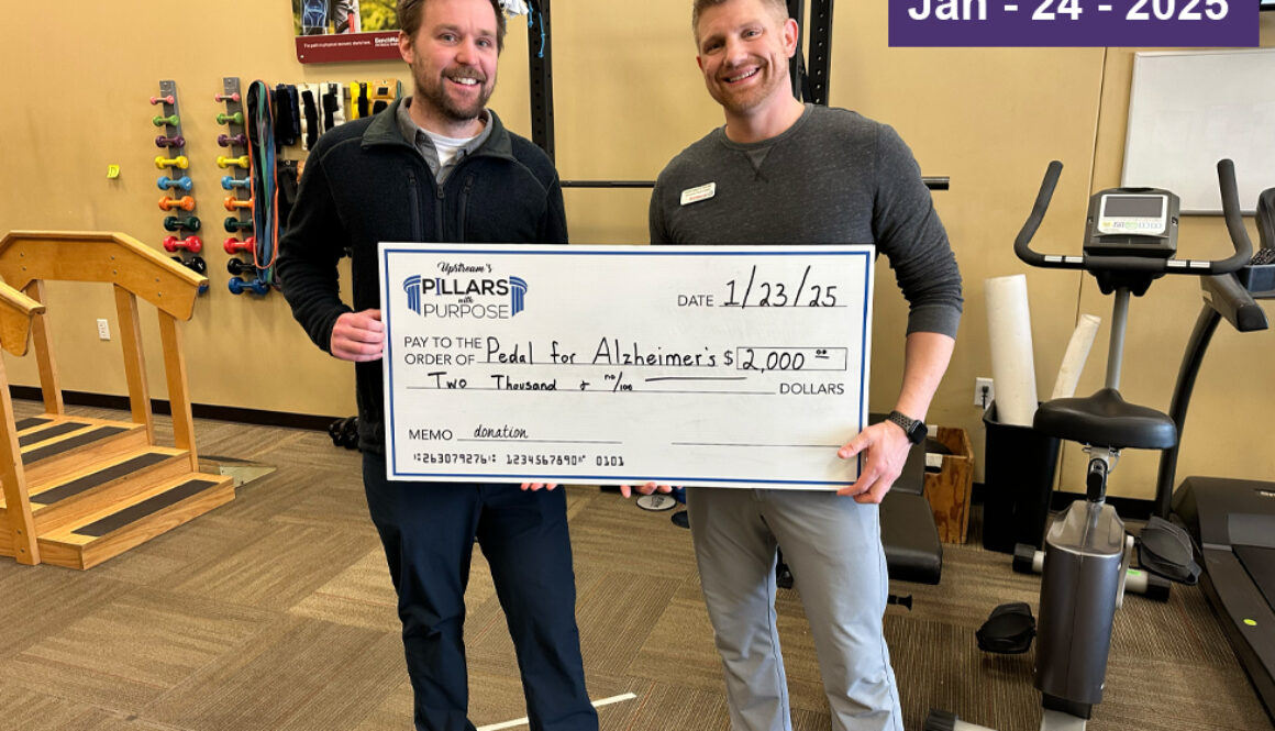 BenchMark Therapy presents generous check to Pedal for Alzheimer's