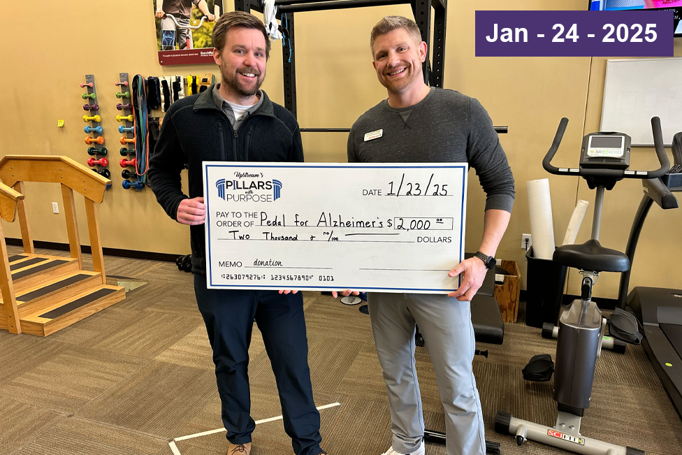 BenchMark Therapy presents generous check to Pedal for Alzheimer's