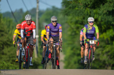 A group of cyclist enjoy riding together
